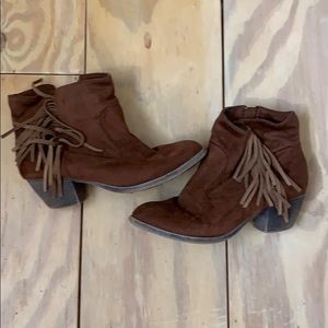 Brown fringe booties.